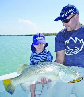 Anthony Hargrave and son Oli with typical Norman River barra trolled up on a JJ Aussie Jumper.